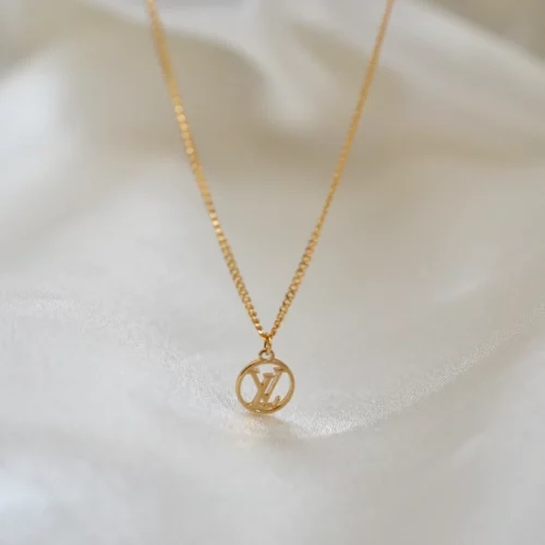 Win a Louis Vuitton Reworked Pendant and Necklace for FREE!